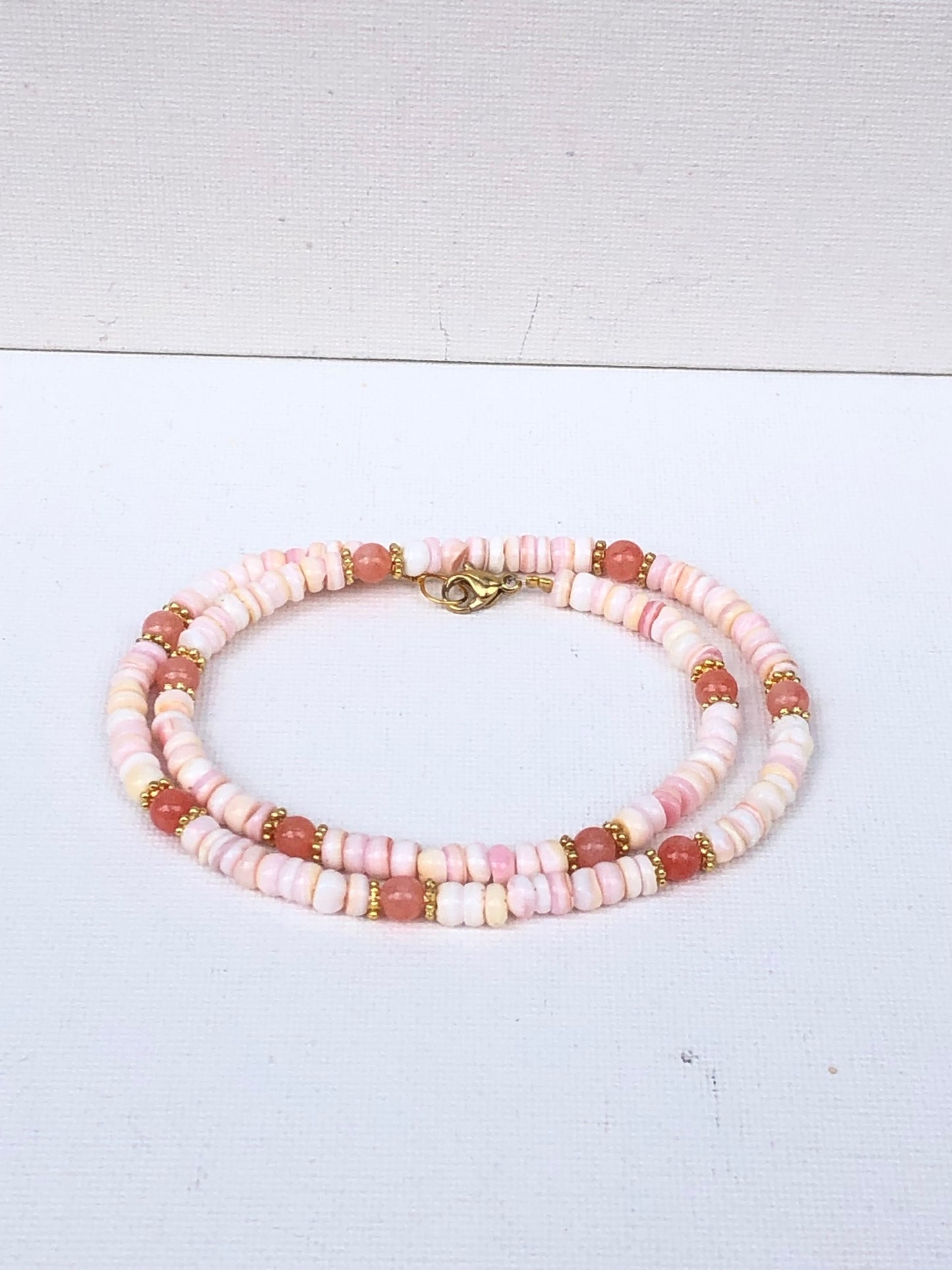 Bracelet double en conche et corail